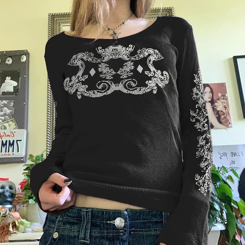 Blusa vintage com estampa de crista e manga sino