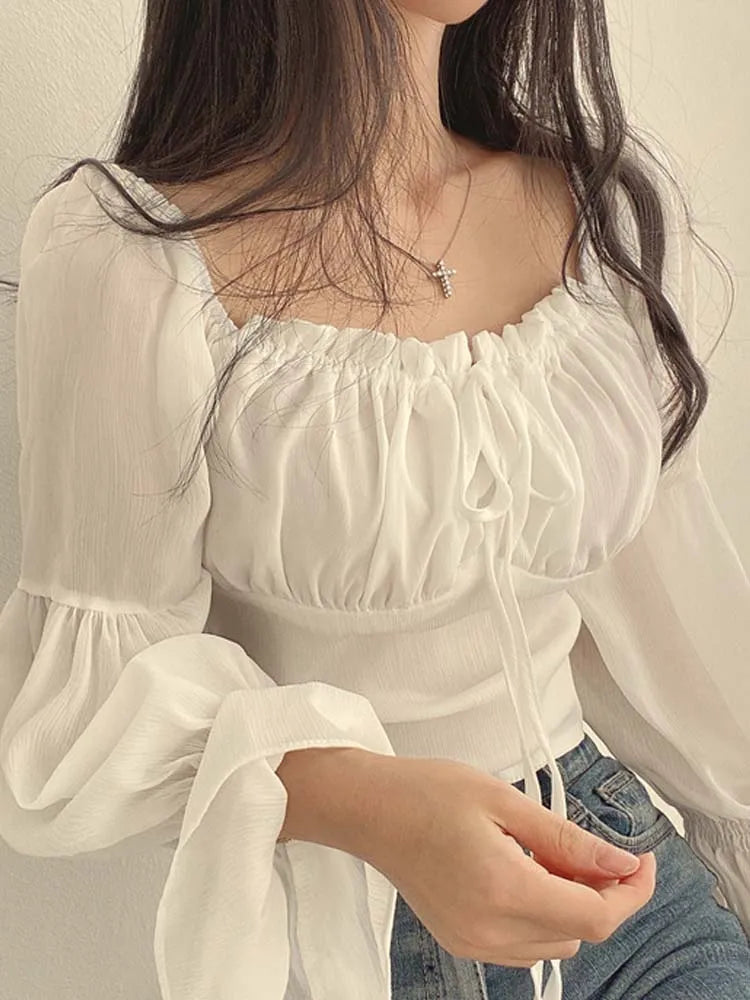 Camisa vintage estilo boho com manga bispo